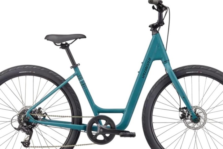 Teal step-through bicycle with black seat and handlebars on white background.